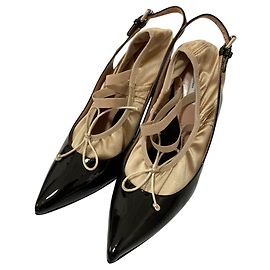 Escarpins en cuir verni Moschino Noir Beige