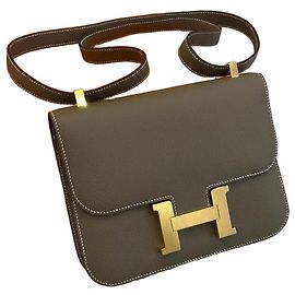Hermès Constance 24 cuir Epsom gris Etoupe avec finitions dorées Gris