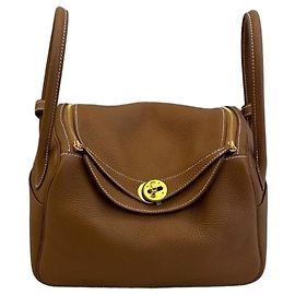Hermès Lindy 26 in pelle Taurillon Clemence Oro Marrone