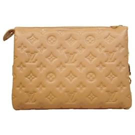 Bolso de mano Coussin PM en cuero Monogram grabado Louis Vuitton Camello
