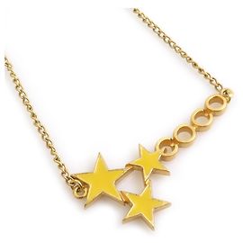 Collier en métal émaillé COCO Star de Chanel Doré Jaune