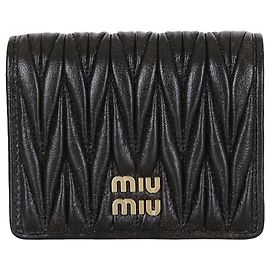 Miu Miu Pequeña cartera con efecto vintage Negro
