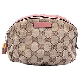 Clutch em canvas GG bege da Gucci com alça de bambu Bege