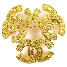 Spilla Triple Coco Mark Vintage Chanel 1994 D'oro