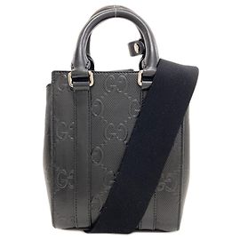 Gucci 696010 GG Embossed Mini Handbag Black