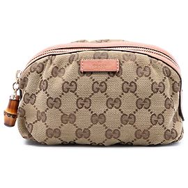 Clutch em lona GG bege da Gucci com alça de bambu Bege