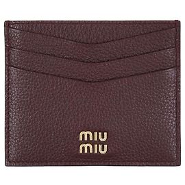 Miu Miu Porta tarjetas de metal dorado con logo Dorado Metálico