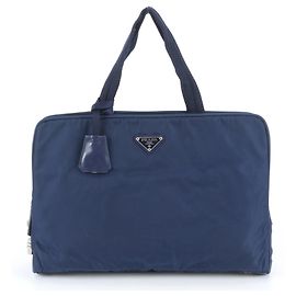Bolsa de mão em nylon Tessuto com logo triangular Prada Azul
