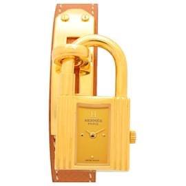 Hermès Montre Hermes Kelly - Plaqué or avec bracelet en cuir Autre