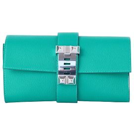 Clutch Hermès Medor em couro verde com hardware em paládio Outro Verde