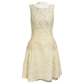 Vestido de coquetel sem mangas em jacquard texturizado marfim Carolina Herrera Bege