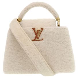 Bolsa Louis Vuitton Capucines BB em pele de cordeiro shearling e couro branco como nova LV VUITTON Marrom