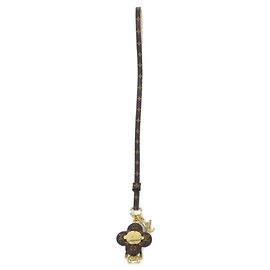 Charm de Accesorio Monograma Louis Vuitton Mini Vivienne Castaño