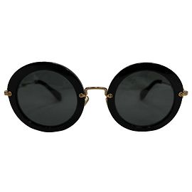 Gafas de sol redondas Miu Miu SMU13N en acetato negro Negro