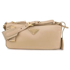 Prada Pequena bolsa de ombro de nylon Marrom