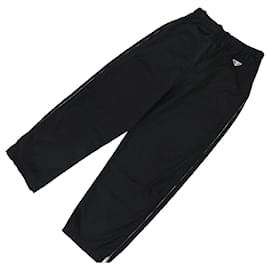 Prada Calça larga de nylon com zíper e logo triangular preto Preto