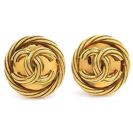 Boucles d'oreilles clips en métal doré Chanel Doré