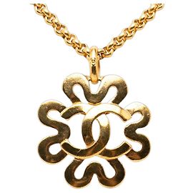 Collier pendentif en fleur plaqué or CC doré de Chanel Doré