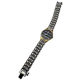 Montre pour femmes Yves Saint Laurent vintage bicolore cadran noir Doré