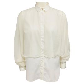 Blusa in chiffon di seta trasparente avorio e cotone elasticizzato con maniche lunghe e bottoni frontali di Brunello Cucinelli Beige