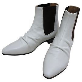 Céline Bottines courtes en cuir Celine Marron Blanc