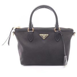 Borsa a mano Prada nera in pelle e tela Nero
