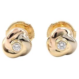 Pendientes de diamante Baby Trinity de Cartier Dorado