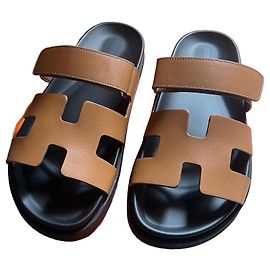Hermès Chypre Sandals Gold Brown