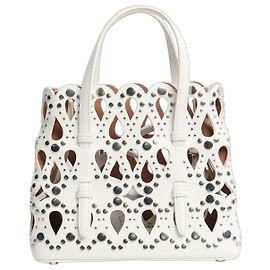 Alaïa Bolsa de ombro branco em couro com tachas e corte a laser Branco