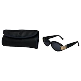Lunettes de soleil vintage Yves Saint Laurent noires et dorées avec logo YSL Noir