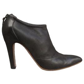 Botas Alaïa em couro Marrom