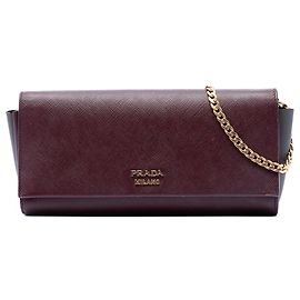 Clutch Bibliotheque em Saffiano vermelho e couro City da Prada com corrente Vermelho Bordeaux