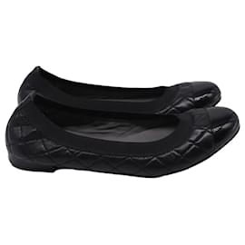 Sapatilhas acolchoadas Stuart Weitzman em couro preto Preto
