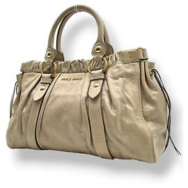 Borsa Tote Miu Miu in pelle Vitello Lux Beige D'oro