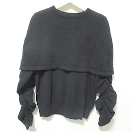 Autre Marque Heve Cape Strickpullover mit Rüschen Schwarz