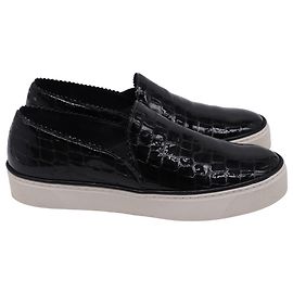 Tênis slip-on Nuggets em couro preto com estampa de crocodilo Stuart Weitzman Preto
