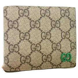 Portafoglio bi-fold Gucci GG Supreme marrone e verde Marrone Verde