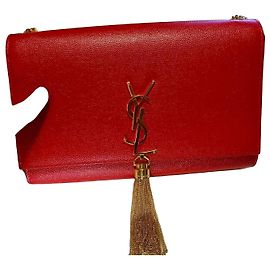 Yves Saint Laurent Bolsa Saint Laurent Kate em couro vermelho com pompom Vermelho