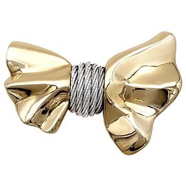Broche Fred "Nœud", ouro amarelo e aço. Outro