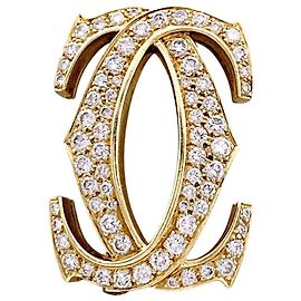 Spilla Cartier, "Double C", oro giallo, diamanti. Altro