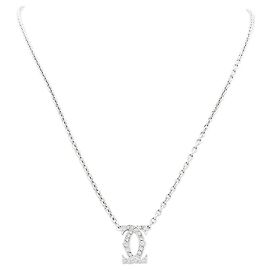 Colar Cartier, "Double C", ouro branco e diamantes. Outro