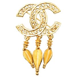 Broche Chanel Coco Mark à franges avec logo Doré