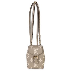 Louis Vuitton Tourterelle Empreinte Giant Monogram Tiny Backpack Marron
