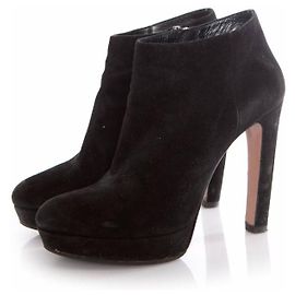 Prada, bottes à plateforme en daim noir. Noir