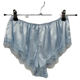 Autre Marque KAT THE LABEL Blaue Satinshorts mit Spitzendetails Blau
