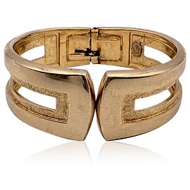 Dior Bracelet jonc rigide en métal doré vintage Christian Doré