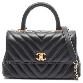 Bolsa 2WAY de couro Chanel Coco Handle Chevron Preto