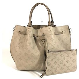 Bolsa Louis Vuitton Mahina Girolata Bege Outro