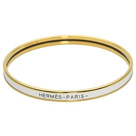 Hermès Bracelet charm en émail doré et blanc Hermes Blanc Doré