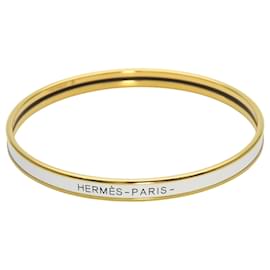 Hermès Bracciale charm in smalto oro e bianco Hermes Bianco D'oro